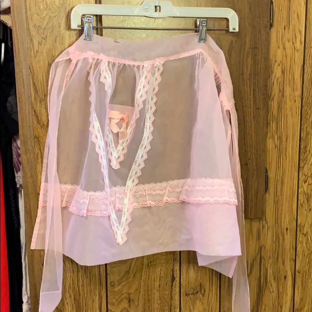 3 pink aprons